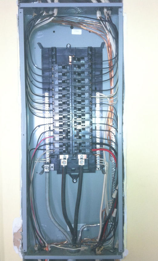 this is a electrical panel we just changed out notice how it looks like a rats nest, electrical, new panel we just installed safe and up to code