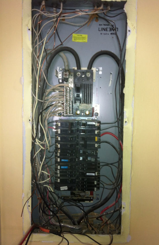 this is a electrical panel we just changed out notice how it looks like a rats nest, electrical, old panel we just removed sloppy