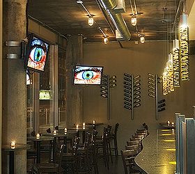 things to do with concrete, concrete masonry, home decor, painted furniture, Bar in Mid City Cafe fabricated in gray concrete with wine bottles and glasses mixed in There are bottles in profile and glasses sliced in half so you see the full profile in the concrete