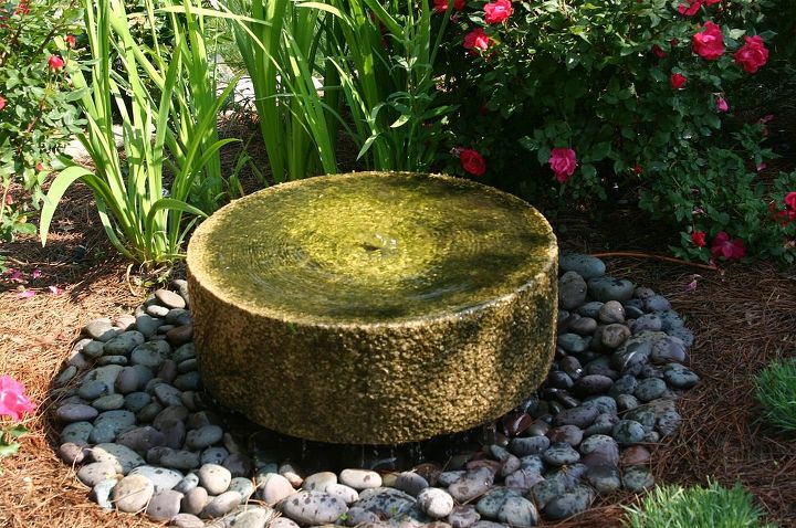 water in the garden add a water garden to your garden this spring, gardening, ponds water features, millstone fountain