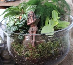 terrariums in all shapes and sizes, crafts, gardening, terrarium, I love to glue fairies to rocks and put them in my terrariums like this little one who s resting in this bowl