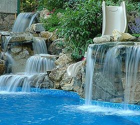 hanging by the pool today, outdoor living, ponds water features, pool designs, spas, 30 000 gallons of water per hour flow over these mossrock waterfalls These are photos are all of the same pool project my personal favorite