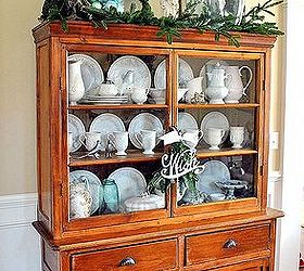 my favorite cabinet all decked out for christmas, christmas decorations, kitchen cabinets, seasonal holiday decor, wreaths