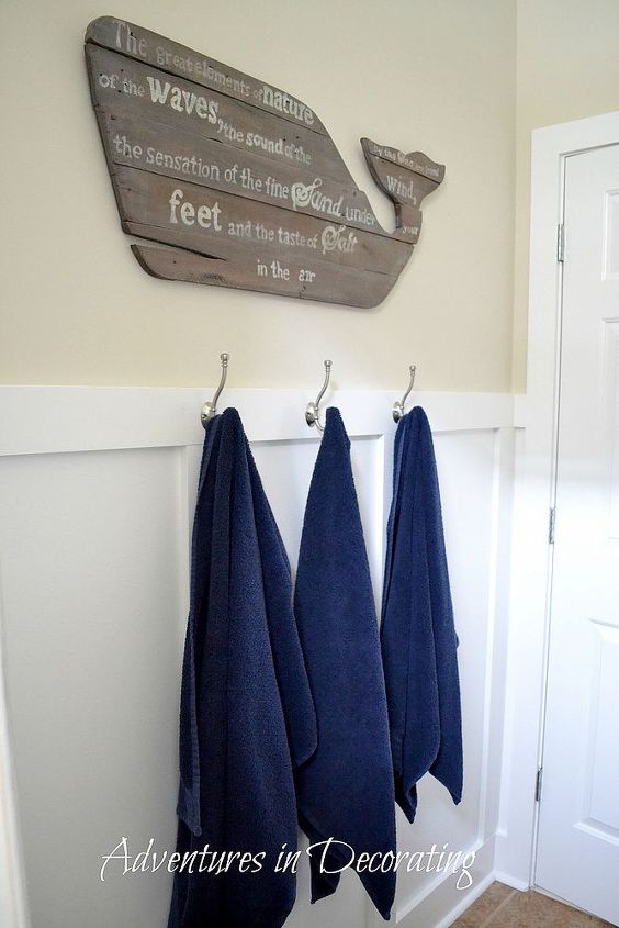 son s revamped bathroom, bathroom ideas, home decor, We added board and batten to brighten this small space up a bit Hopefully these hooks will be easier for our 7 year old to hang up wet towels