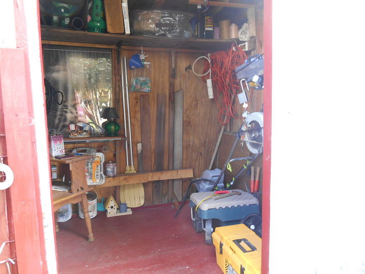 it s time for fall cleaning i started out in my old shed, cleaning tips, Upper shelf holds electric yard tools pond equipment etc I hung a nice shelf up to put my out door candles oil lamp on Paints are stored below Electric cord hung up my Tiller Garners wagon tool box al easy to get to