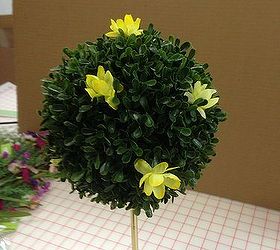 hometalk diy spring topiary inspiration, crafts, seasonal holiday decor, Start placing the flowers in the boxwood ball until you are satisfied with the placement I did not glue these in place I was thinking that I wanted to beable to change the topiary for the seasons