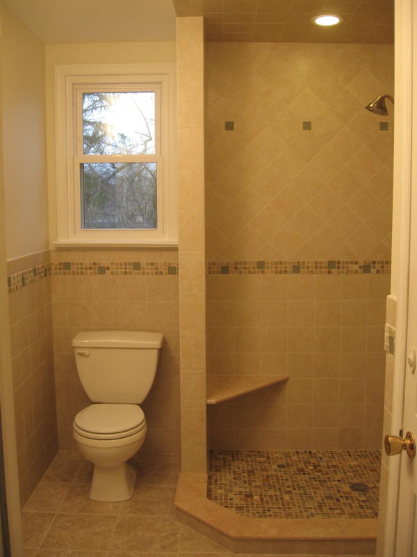 bathroom remodeling tile shower, bathroom ideas, tiling, Tiled stall shower with 6x6 porcelain tile glass tile mosaic marble seat and natural stone mosaic floor glass doors not installed yet