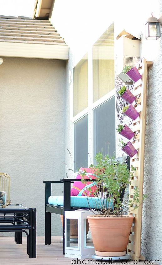 our colorful repurposed deck makeover revealed, decks, outdoor furniture, outdoor living