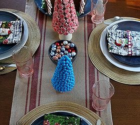 candy land christmas tablescape, christmas decorations, crafts, seasonal holiday decor, Blue plates from a local potter is the beginning point of this tablescape