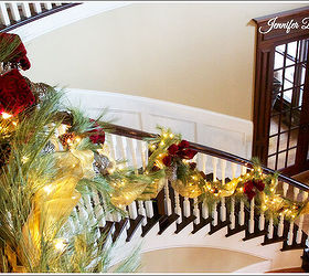 decorating a staircase, foyer, seasonal holiday decor, stairs, I used pipe cleaners to attach the greenery to the staircase in order to not damage the woodwork
