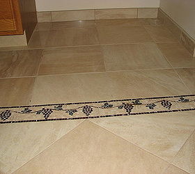 new kitchen floor, flooring, tile flooring, tiling, matching bullnose tile used for base