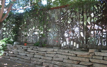 Our mirror mosaic fence. We had a blast creating this. Amazing what can come from a broken mirror mishap.