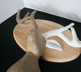 simple decoration for the holidays paper mache deer head, crafts, seasonal holiday decor, wall decor, Painted the Paper Mache deer head with white acrylic paint and let it dry overnight