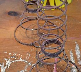 bed springs and bottles turned into candle holders, home decor, repurposing upcycling