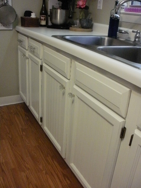 look what happened to my kitchen in two days, kitchen cabinets, kitchen design, painting, Beadboard wallpaper was added to the fronts of the cabinet doors and then painted with Valspar Signature paint and primer Polyurethane was used as a final coat for added durability