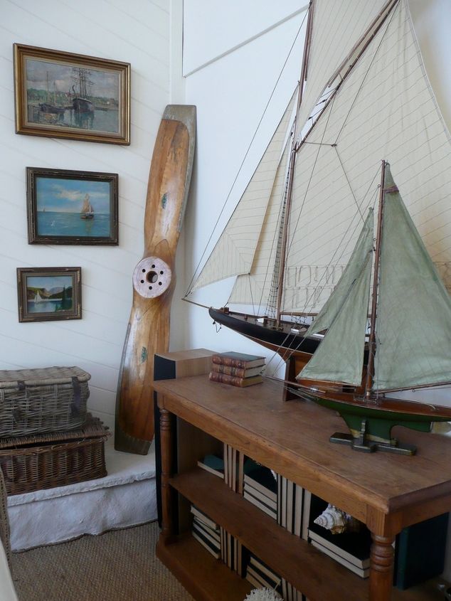 decorating with ship models and vintage aircraft propeller, home decor