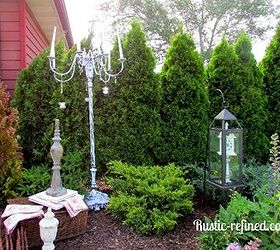 repurposing old lighting into out yard art an outdoor candlelier, gardening, outdoor living, repurposing upcycling