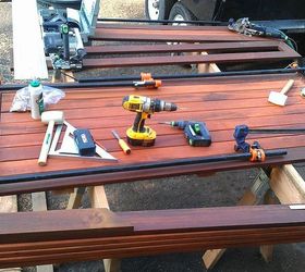 picnic table, diy, how to, painted furniture, woodworking projects, After the sanded and oiled pieces had the night to dry I brought them outside cut them to size and assembled The Ipe frame is mitered wiped with distilled alchohol plowed out with the Festool Domino glued and clamped