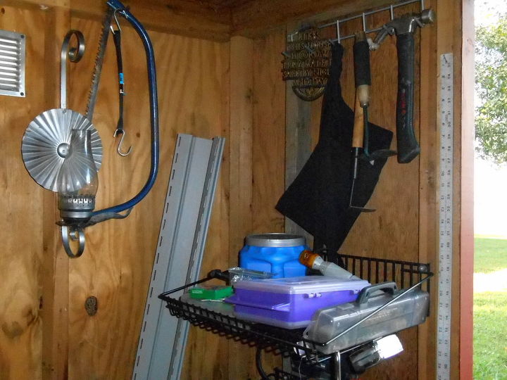 it s time for fall cleaning i started out in my old shed, cleaning tips, Far wall has a lanter tree saw The front near the door has hooks shelf racks to hold screws nails
