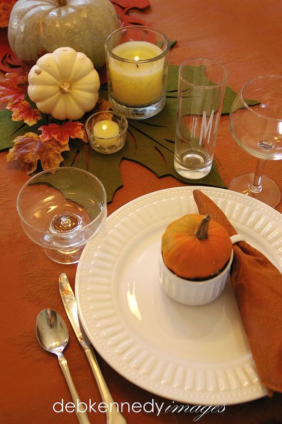 spice up your holiday table decor, seasonal holiday d cor, thanksgiving decorations, Using a coffee cup as a combination napkin ring and place card holder saves space on the table a pumpkin flower or small gift easily fits into the cup and brings more detail to the table