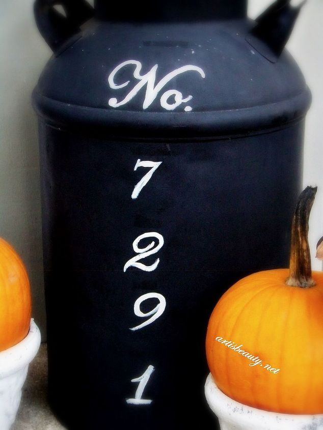 old antique milk can turned address marker, repurposing upcycling