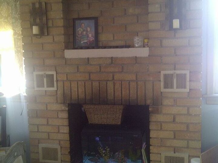 fireplace ugh, fireplaces mantels, home decor, living room ideas, This is our fireplace with a fishtank atm Need advise hate it as it is right now