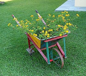 creative planters ideas for garden and balcony, curb appeal, flowers, gardening, repurposing upcycling, handmade wagon about a century old in Chalkidiki