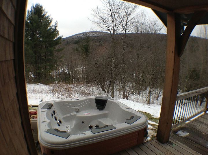 hot tub installation in the snow bullfrog spa installedon a second story deck in, outdoor living, pool designs, spas, Bullfrog Spa installed next to a raised deck We raised this spa up 18 to make it easy to get into