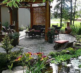 create a tropical dining spot in your backyard, decks, gardening, outdoor living, patio, ponds water features, A shady spot near the pond is a great place to dine and entertain during the summer
