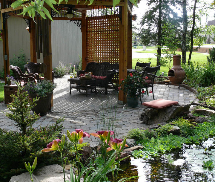 create a tropical dining spot in your backyard, decks, gardening, outdoor living, patio, ponds water features, A shady spot near the pond is a great place to dine and entertain during the summer