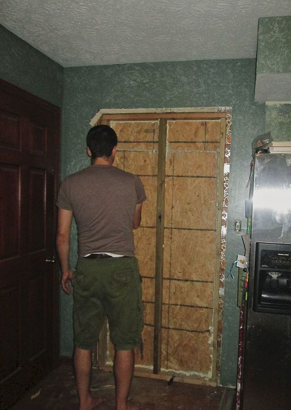 the door to nowhere, diy, doors, home maintenance repairs, Fill in with plywood caulking spray foam