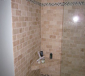 i tore out a fibergladd tub shower combo and replaced it with a beautiful stone, I added a seat in the shower My contractor did a Fantistic job