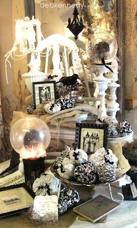 create a crystal ball from a clear glass lamp globe, crafts, halloween decorations, seasonal holiday decor, These two Crystal Balls were created on an electrified hurricane lamp from the thrift shop and on a small white glass urn glued to a candlestick They make a fun table centerpiece