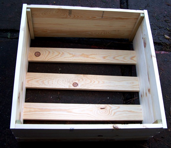 make a christmas tree crate hide that ugly stand, christmas decorations, hardwood floors, seasonal holiday decor, woodworking projects, Fitting my box all together I did not do a solid bottom