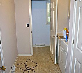 mudroom laundry room update, hardwood floors, laundry rooms, shelving ideas, storage ideas, This is the before picture with two types of flooring
