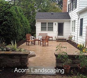 landscape garden design waterfalls water feature patio sitting wall with pillars, Outdoor Living Area with Pond less Waterfall Paver Patio Sitting Wall Pillars and Steps in Brighton NY by Acorn Landscaping of Rochester NY