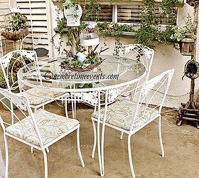 spring solar table center piece wrought iron table recovered cushions, home decor, outdoor furniture, outdoor living, painted furniture, New recovered cushions with fabric napkins and sealed with Thompson Fabric sealer