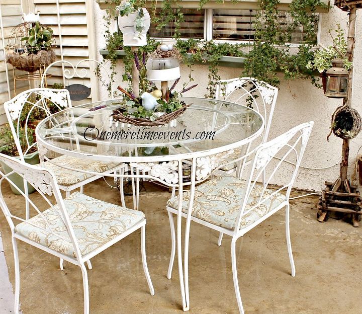 spring solar table center piece wrought iron table recovered cushions, home decor, outdoor furniture, outdoor living, painted furniture, New recovered cushions with fabric napkins and sealed with Thompson Fabric sealer