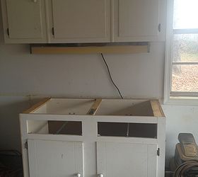 old garage cabinet redo for less than 30, kitchen cabinets, painted furniture, rustic furniture, Before