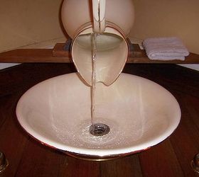 sink we made from an old wash basin and it s pitcher