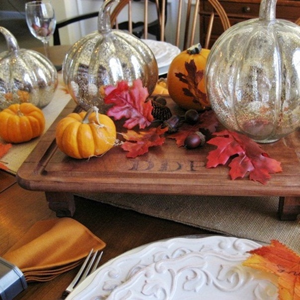 thanksgiving tablescape mercury glass pumpkins and vintage wood, home decor, seasonal holiday decor, thanksgiving decorations, A vintage serving board serves as the centerpiece of the Pottery Barn inspired tablescape