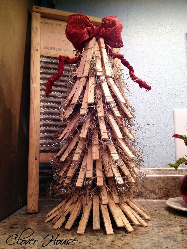 clothespin christmas tree, christmas decorations, repurposing upcycling, seasonal holiday decor, This little tree started out with an empty paper towel roll and ended up looking so adorable