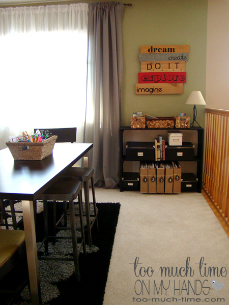 craft room reveal, cleaning tips, craft rooms, storage ideas, The stools are from Decor Steals The rug table and curtains are all from IKEA I made the pallet art and painted the bookcase that I used to use in my classroom The numbered paper organizers were made from old postal boxes