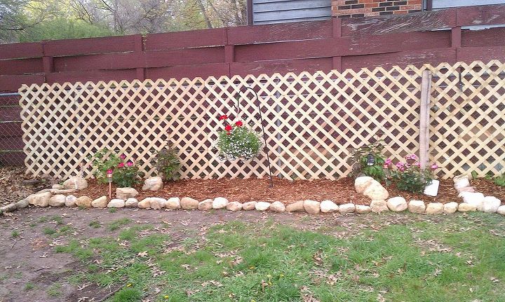 hiding unsightly fence areas, See how the lattice board covers the unsitely plywood