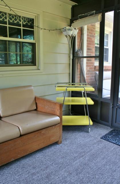 a sun room of thrifted furniture, outdoor furniture, outdoor living, painted furniture, repurposing upcycling, The retro yellow cart nestled in with the love seat