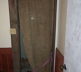 q this bathroom needs help on a budget help me friends, bathroom ideas, home decor, home improvement, home maintenance repairs, painting, You like burlap You want rustic You can t sew I give you Hot Glue litter box curtain Still needs trim at top where glue shows 3 13 14