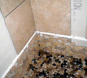 upstairs bathroom, bathroom ideas, home improvement, she wanted a pebble floor in the shower they are amazing on tired feet here the tile s going in