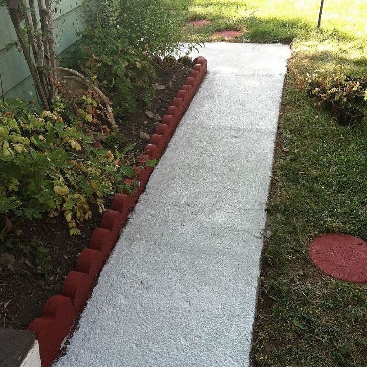 painting a front walk, first painted the red brick with barn yard red paint then I painted the whole walk way a light gray color and painted the red brick with barn yard red paint