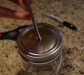 diy mason jar soap dispenser easy and cheap, bathroom ideas, cleaning tips, Punch a hole in the top of your mason jar and widen with pliers