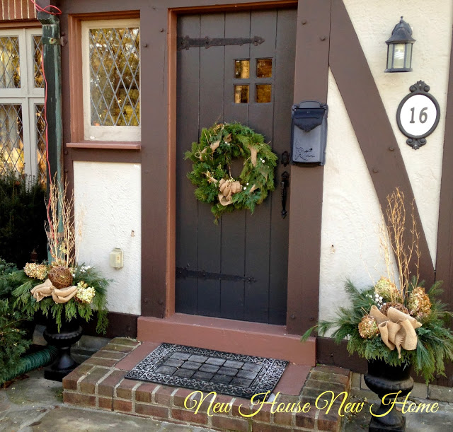 nature inspired holiday decor, christmas decorations, seasonal holiday decor, wreaths, This year we pared back the look and decided against cedar roping around the door With a cleaner look to the house after painting and removing some wrought iron railings the natural look fits nicely